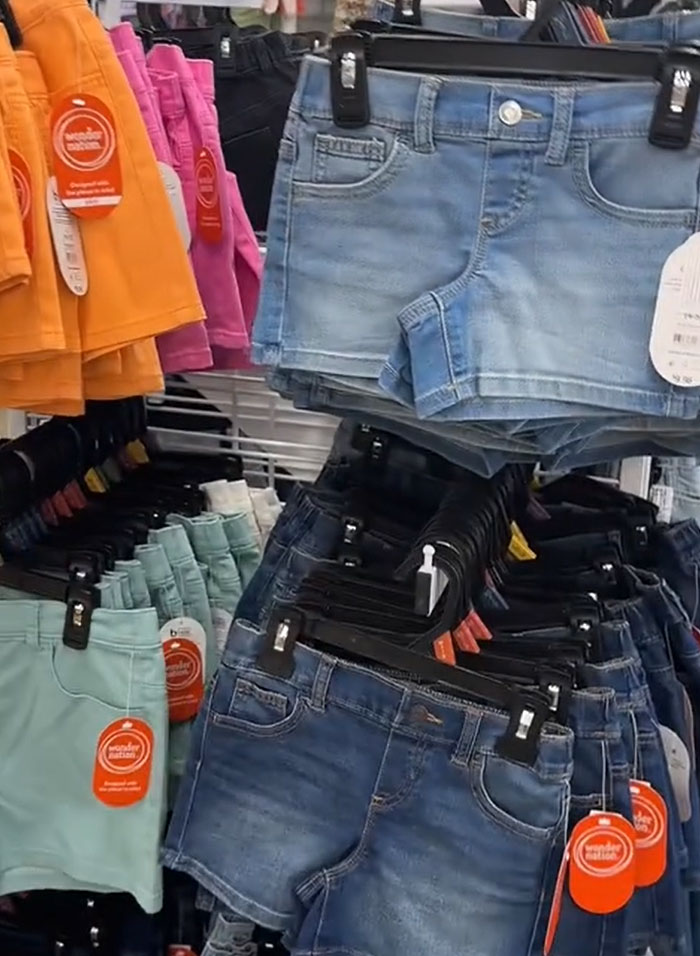 A display of children's shorts in various colors and denim, part of groceries shopping for American parents. A display of children's shorts in various colors and denim, part of groceries shopping for American parents.