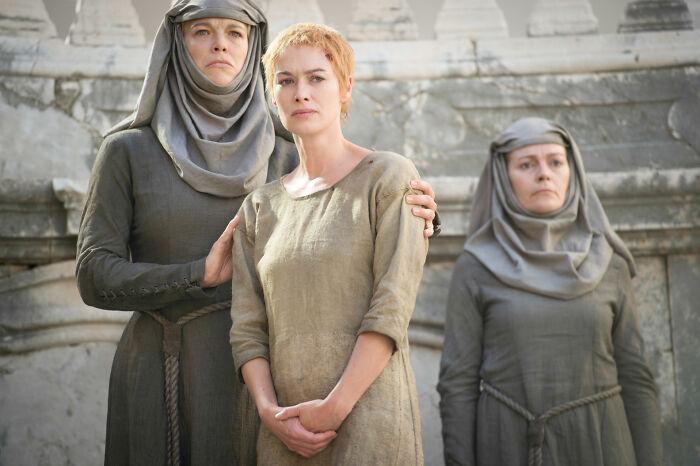 Lena Headey as Cersei Lannister standing with septas, illustrating Shameless Intimate Scenes context. Lena Headey as Cersei Lannister standing with septas, illustrating Shameless Intimate Scenes context.