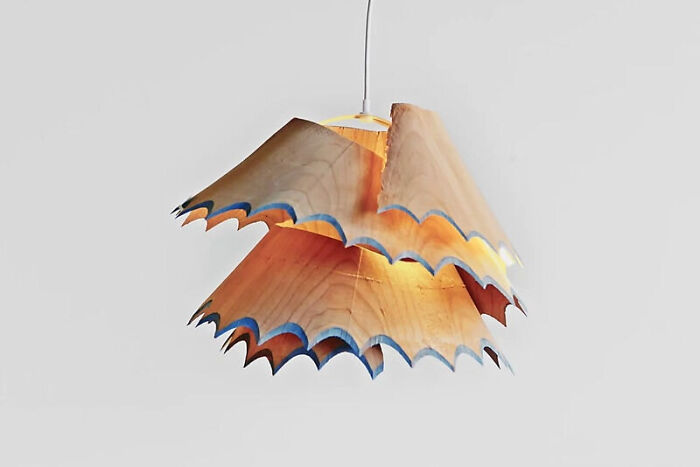A unique hanging light fixture crafted from pencil shavings, a creative home decor project.