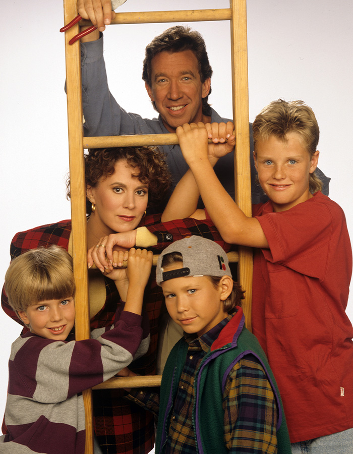 Cast of Home Improvement including Tim Allen, Patricia Richardson, and young Jonathan Taylor Thomas.