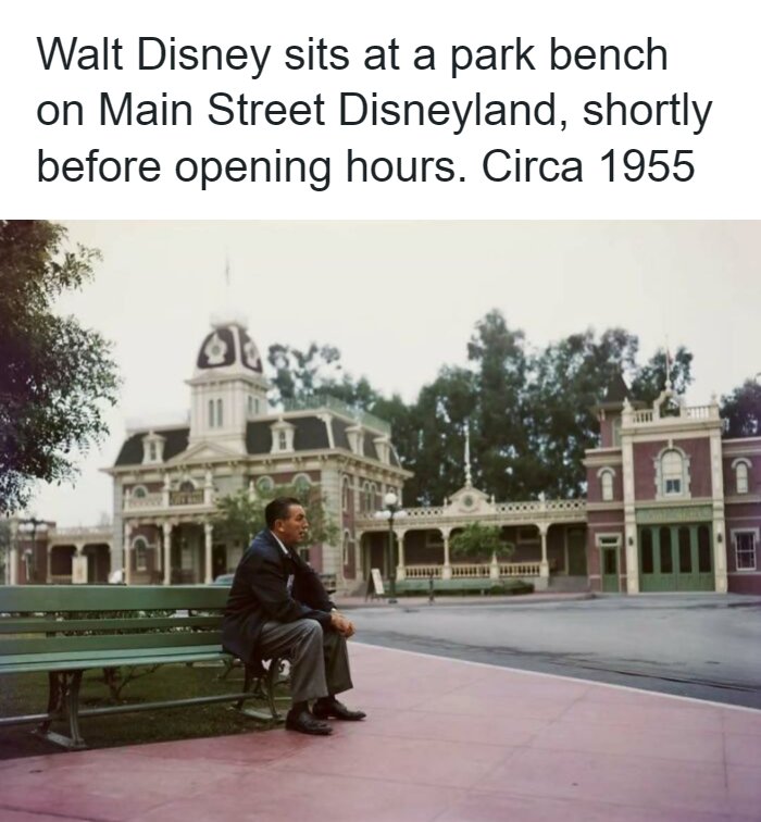 Remarkable photos of Walt Disney sitting on a Disneyland park bench in 1955.
