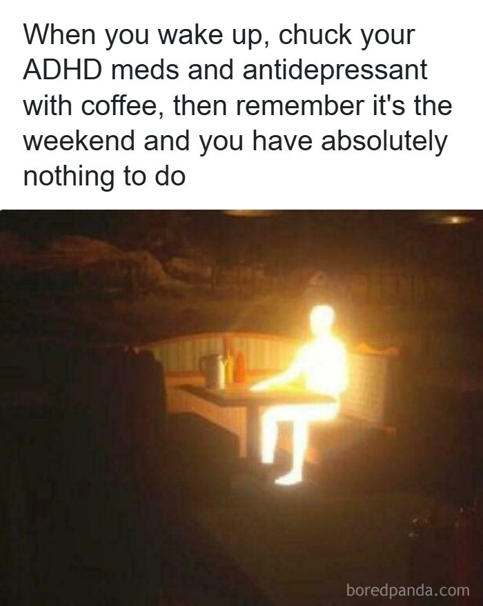A glowing figure in a dark diner representing the realization of having nothing to do from funny ADHD memes.