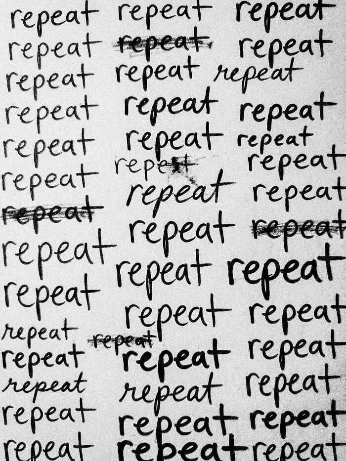 The word 'repeat' written repeatedly across a surface, creating a dystopian and surreal pattern by Marcus Wallinder.
