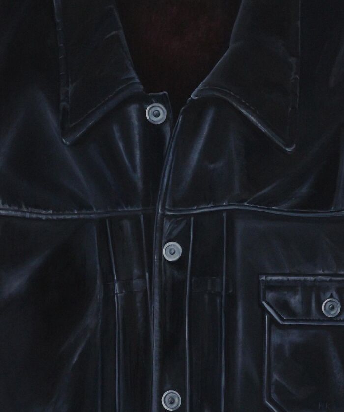 Artist painting of a black leather coat, reflecting striking portraits of identity through clothing.