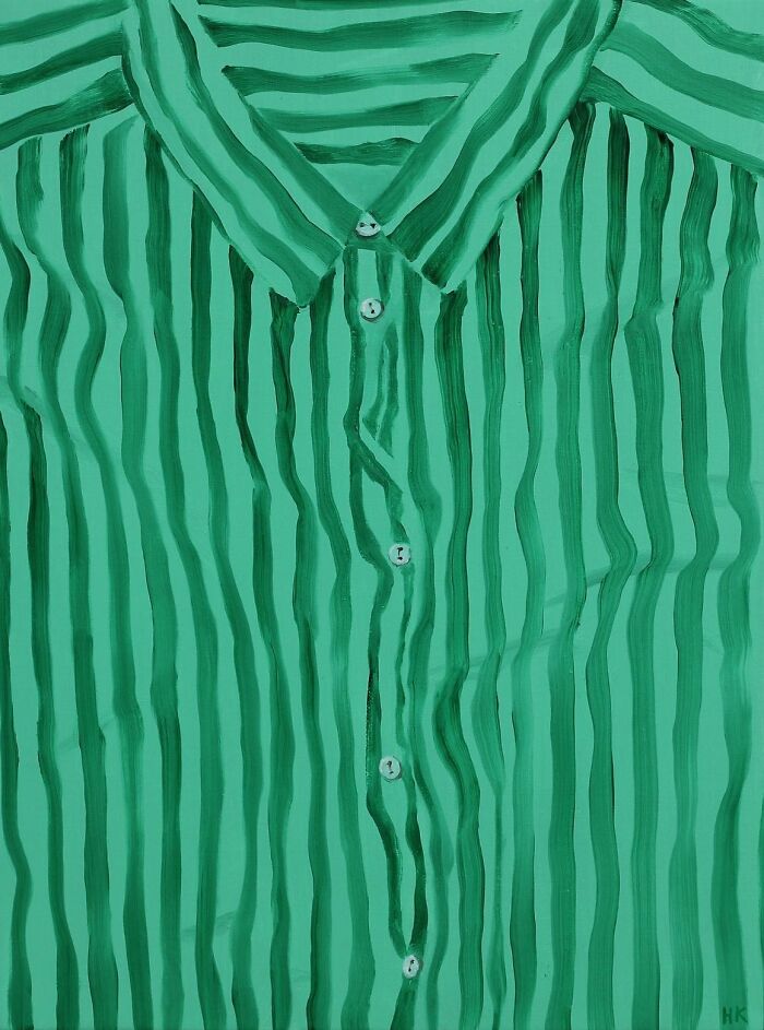 A striking portrait of identity, showing a green striped shirt with white buttons, created by an artist.