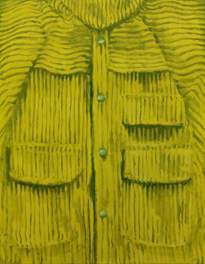 A striking portrait of identity depicting a yellow corduroy jumper with pockets and buttons, highlighting its texture.