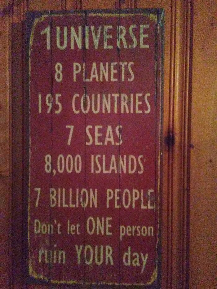 A funny sign with a list of global facts, ending with Don't let ONE person ruin YOUR day.