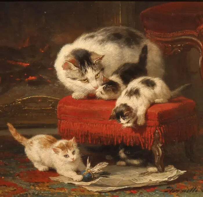 19th Century cat paintings: A mother cat and her kittens on a red velvet stool by a fireplace.