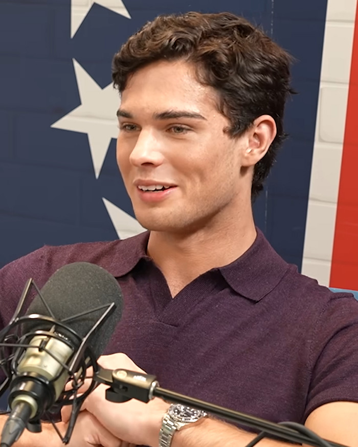 Looksmaxxing influencer Clavicular speaking into a microphone during a podcast. Looksmaxxing influencer Clavicular speaking into a microphone during a podcast.