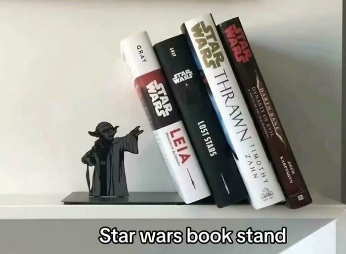 Star Wars themed book stand featuring Yoda holding books as a clever design