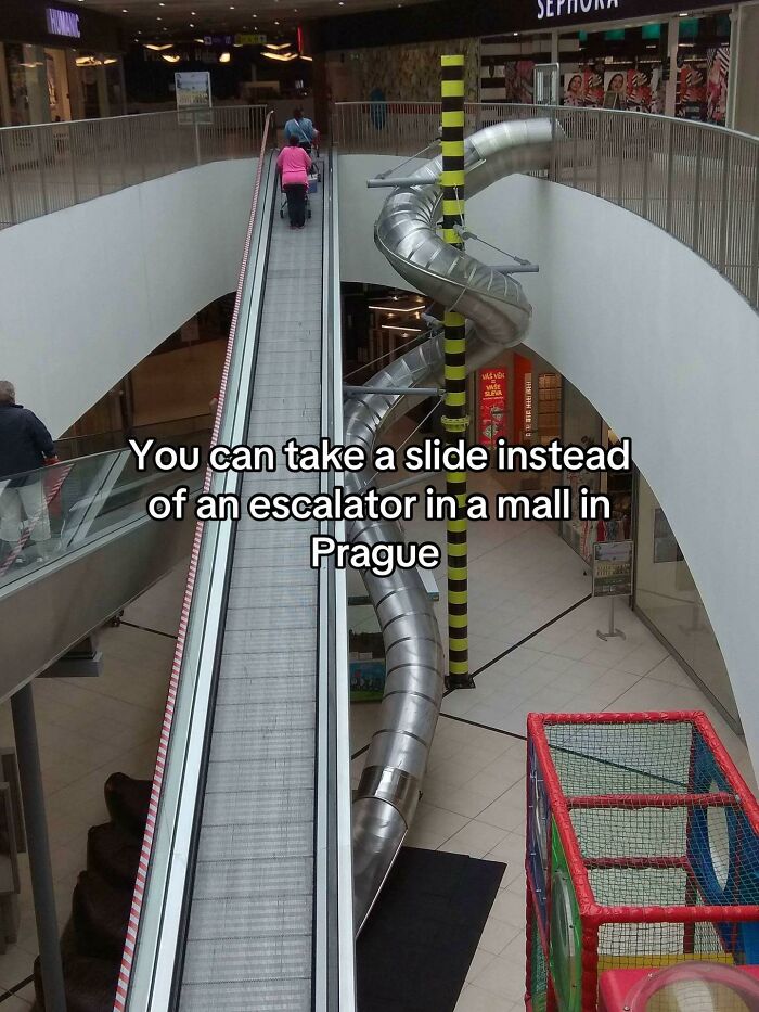 Mall escalator with a slide alternative in Prague demonstrating clever design