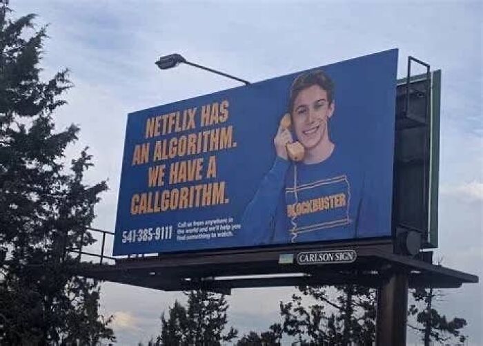People had no idea beliefs and words will age badly, a Blockbuster billboard reads, Netflix has an algorithm, we have a callgorithm.