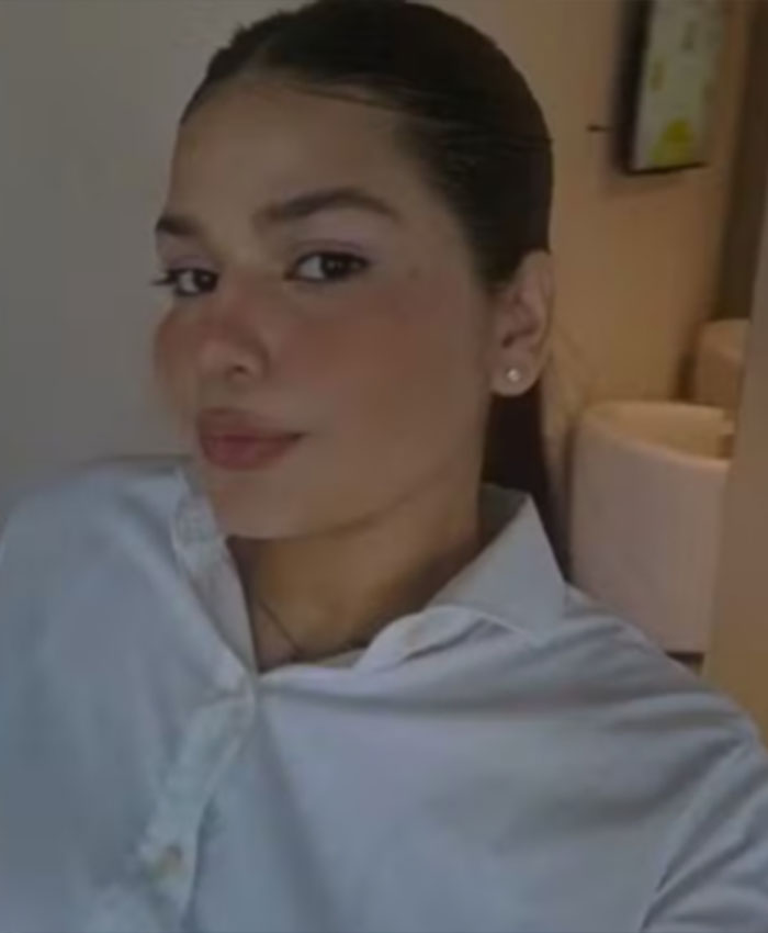 A 22YO daughter posing in a white shirt, showing her face before dating her boss. A 22YO daughter posing in a white shirt, showing her face before dating her boss.