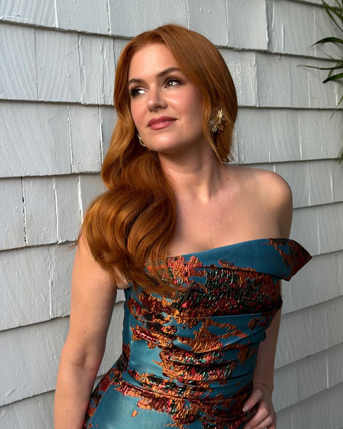 Isla Fisher dating after divorce: Isla Fisher posing in a stylish dress.