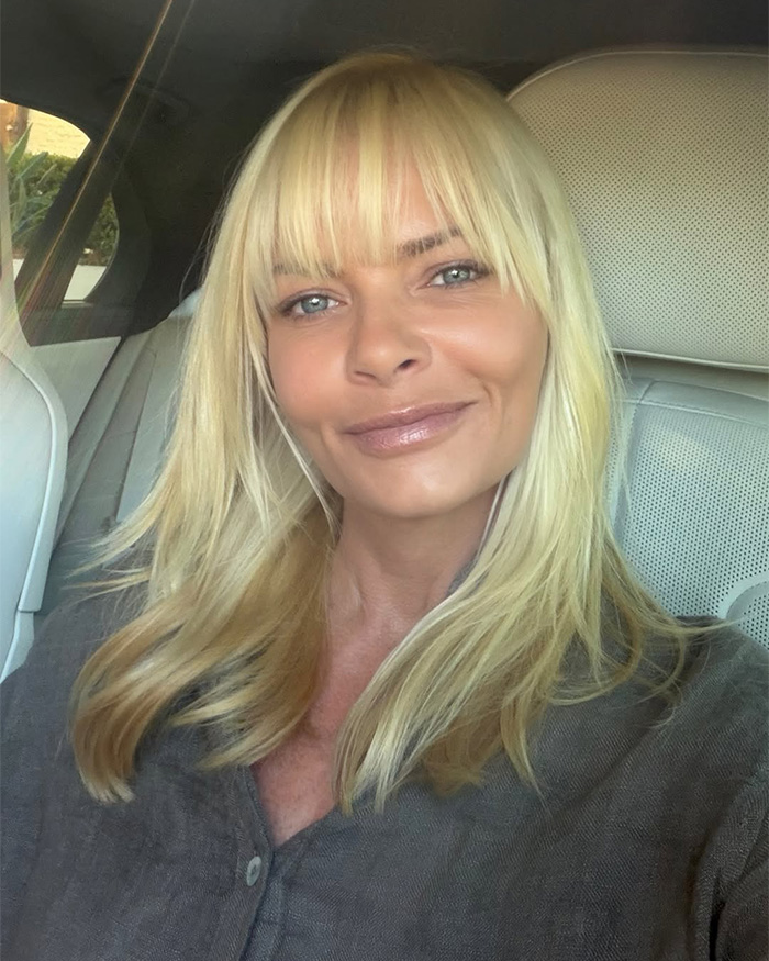 Hollywood actress smiling directly at the camera while seated in a car, months after joining an adult platform. Hollywood actress smiling directly at the camera while seated in a car, months after joining an adult platform.
