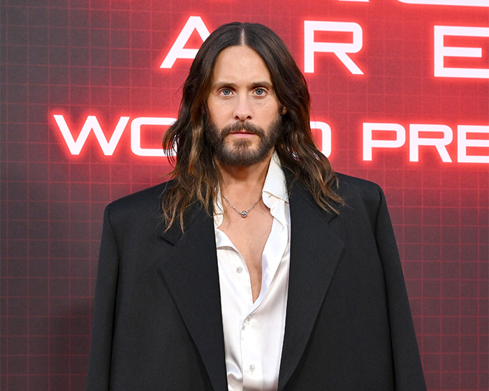 Jared Leto, the actor at the center of the method acting controversy, posing on a red carpet with long hair and a beard. Jared Leto, the actor at the center of the method acting controversy, posing on a red carpet with long hair and a beard.