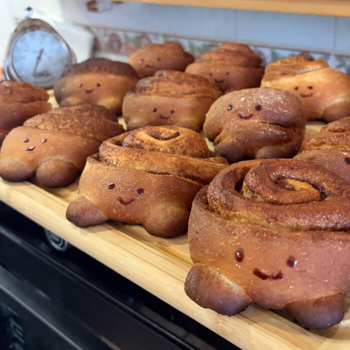 Adorable cinnamon roll treats with happy faces, proving bakers make amazing and delicious food.