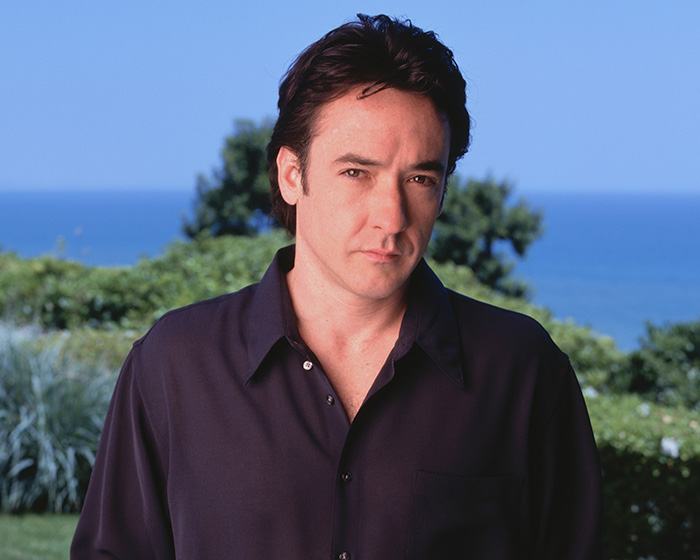 John Cusack's Unrecognizable New Look Sparks Scrutiny As Questions Grow About Cosmetic Work: "What Did He Do?"