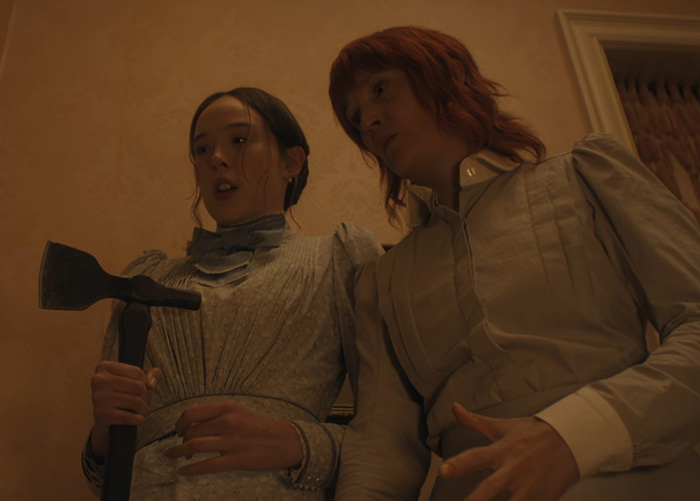 Two women in period costumes, one holding an axe, from Lizzie Borden series. Two women in period costumes, one holding an axe, from Lizzie Borden series.