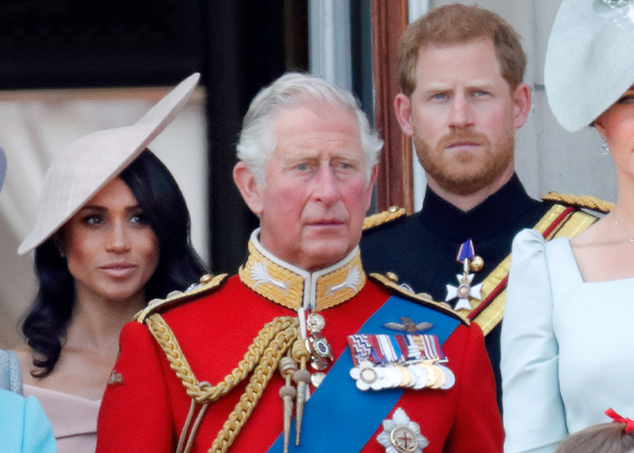 Prince Charles, Prince Harry, and Meghan Markle at a formal event. Prince Charles, Prince Harry, and Meghan Markle at a formal event.