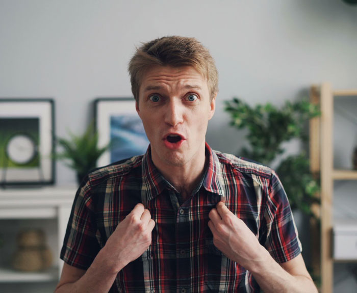 A man looking shocked and confused, gesturing to himself, illustrating the inheritance family drama. A man looking shocked and confused, gesturing to himself, illustrating the inheritance family drama.