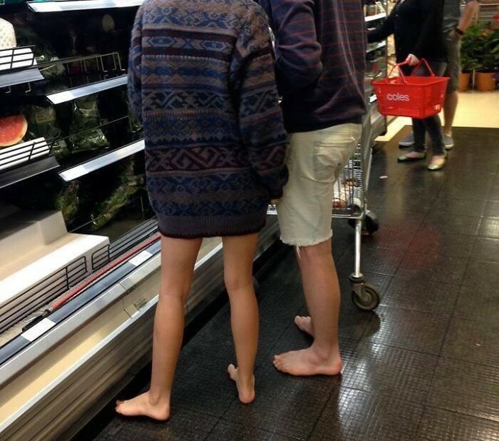 Barefoot people shopping in a grocery store, an action people judge them for.