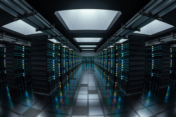AI infrastructure: A data center with rows of servers and flashing lights, symbolizing controversial AI infrastructure near endangered animals.
