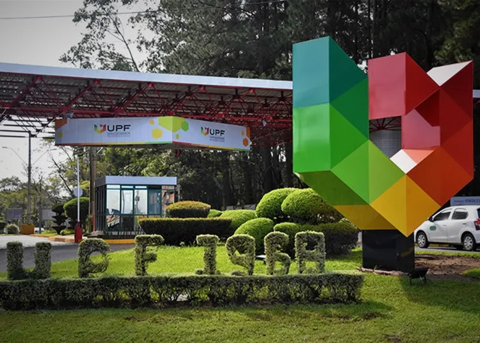 Large colorful outdoor sculpture, an abstract representation of the perfect breast shape.