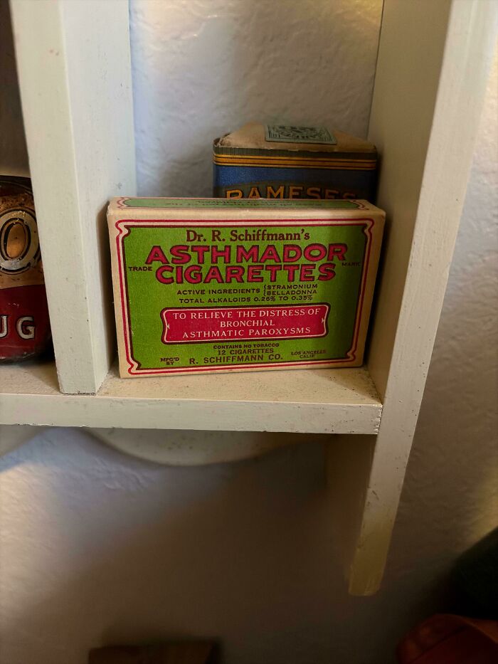 An old box of Asthmador Cigarettes on a shelf, showing medical history treatments for asthma.