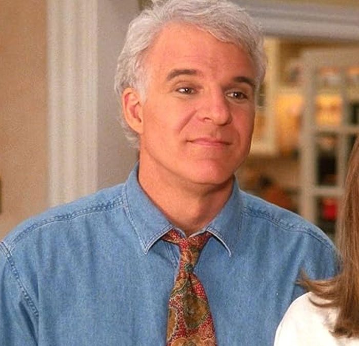 An image of actor Steve Martin in a denim shirt, showcasing stories of celebrities.