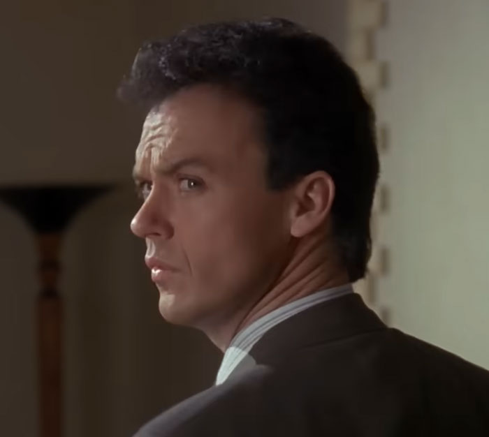 Actor Michael Keaton, one of the iconic celebrities, looking back over his shoulder