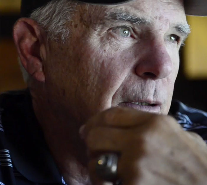 Close-up of a thoughtful older man representing celebrities in ordinary homes