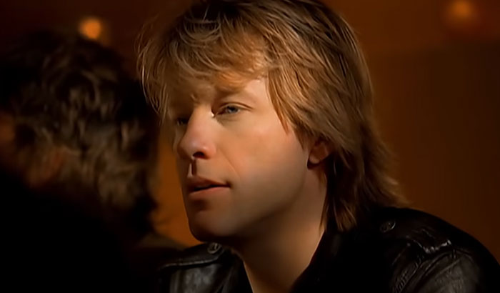 Jon Bon Jovi looking sideways, highlighting times celebrities met fans