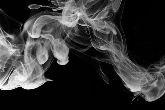 Wispy white smoke on a black background, representing stupid things people said.