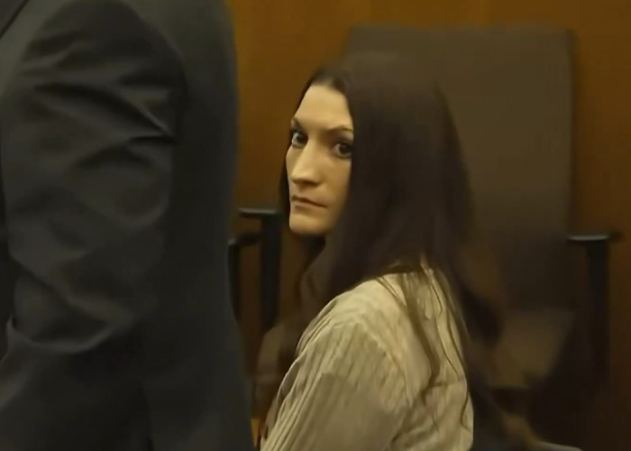 A woman in court, related to Patrick Clancy's heartbreaking revelation about his children after mistrial.