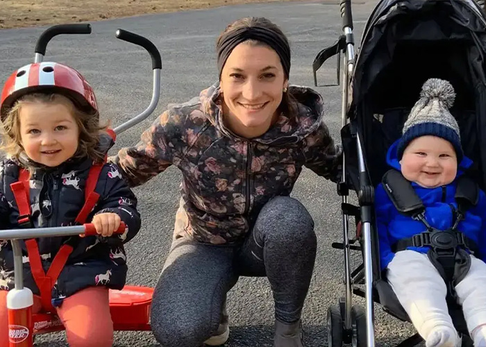 A woman and two young children outside, related to Patrick Clancy's heartbreaking revelation about his children.