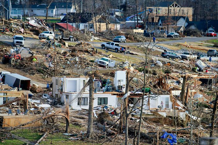 Houses and trees destroyed by a disaster, showing someone's 6th sense may have smelled a rat before it happened.