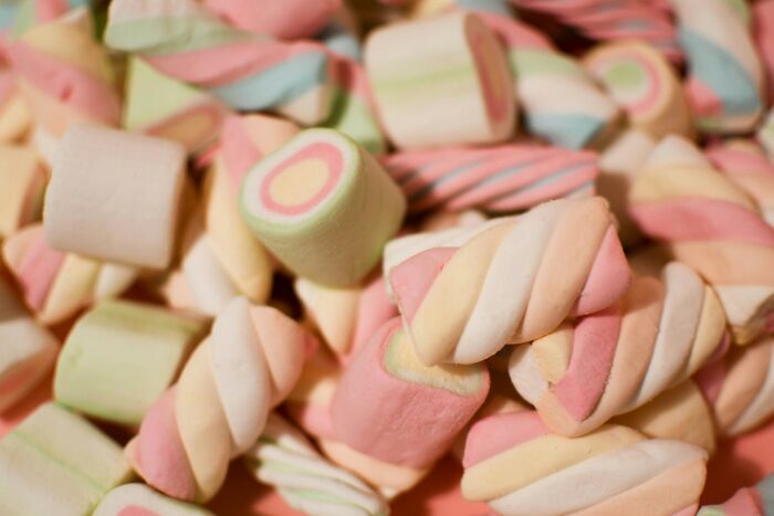 A pile of colorful, twisted marshmallows, representing things people did after their relationships fell apart.