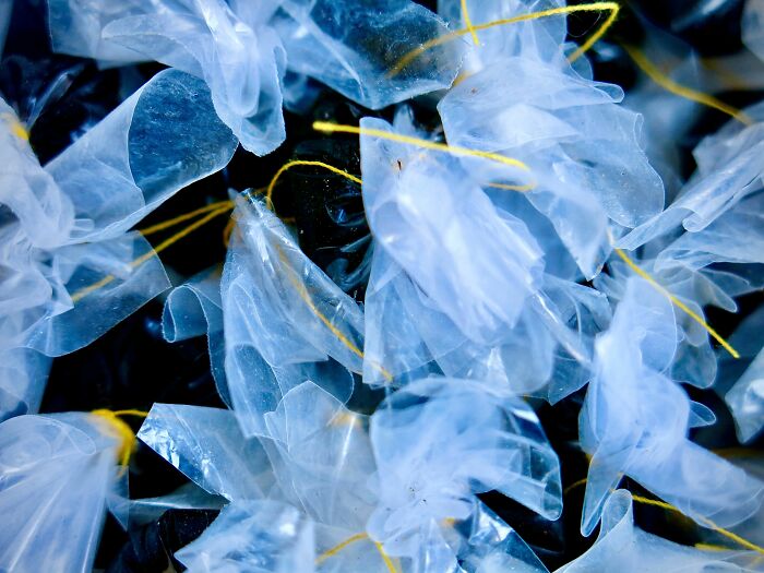 Close-up of translucent plastic packaging, representing some scandals that shocked the public.
