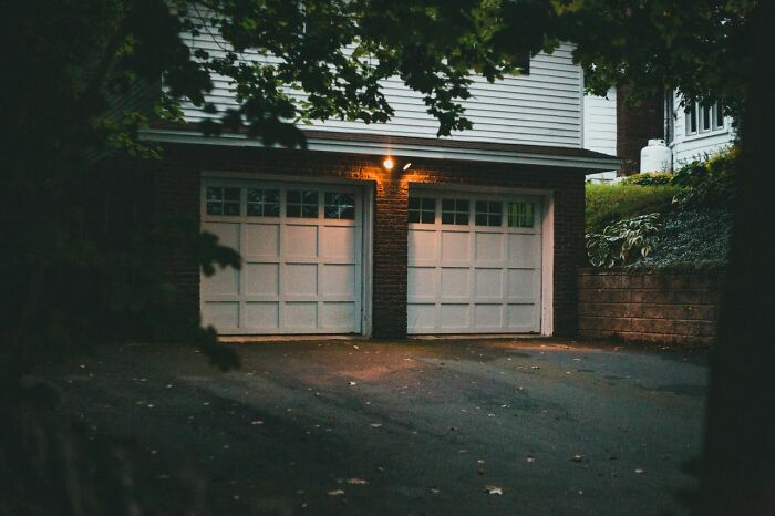 Well-lit garage at night, enhancing safety and protection for women living alone.