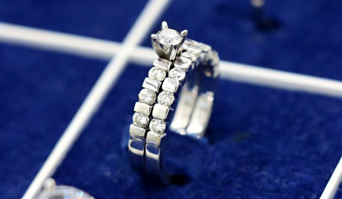 A close-up of a diamond ring, symbolizing the luxury lifestyle of rich people
