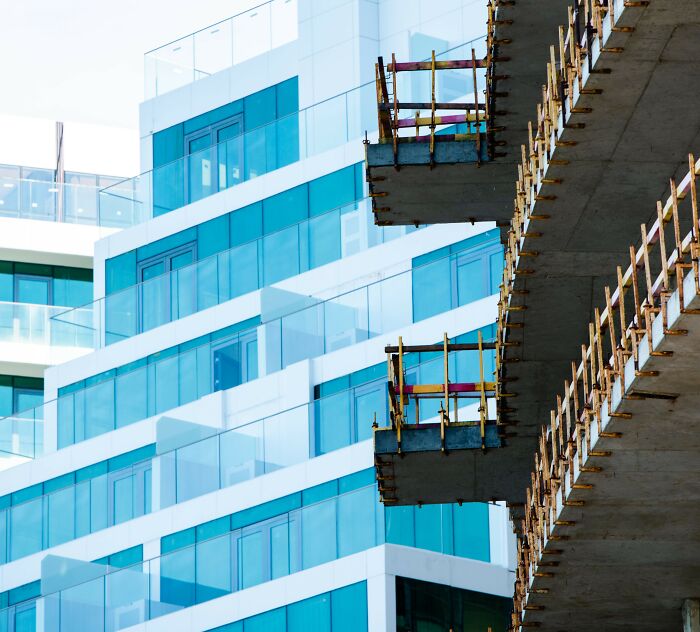 A high-rise building showing modern and unfinished structures, illustrating how a major scandal can halt progress