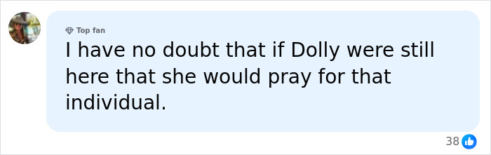 A social media comment stating that Dolly Parton would pray for the individual who disrespected her. A social media comment stating that Dolly Parton would pray for the individual who disrespected her.