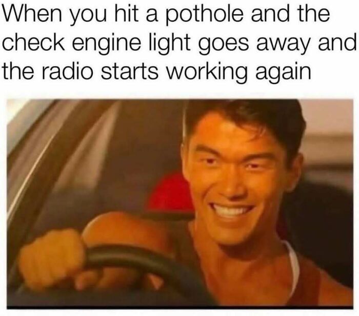 A smiling driver at the steering wheel representing edgy and hilarious memes about car problems