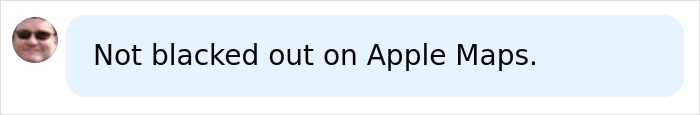 A comment clarifying that the mysterious blacked-out island is not blacked out on Apple Maps.