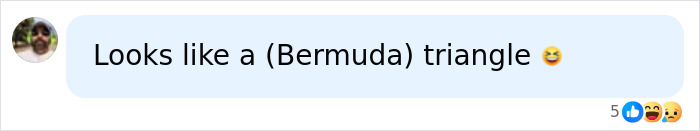 A comment joking that the mysterious blacked-out island looks like a Bermuda triangle.
