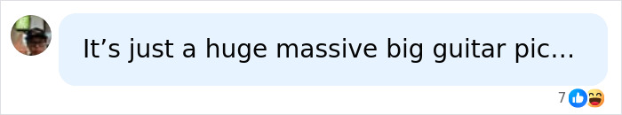 A comment revealing the mysterious blacked-out island is just a huge massive big guitar pick.