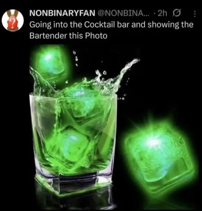 A glowing green cocktail with ice, representing one of the hilarious photos found on the internet.