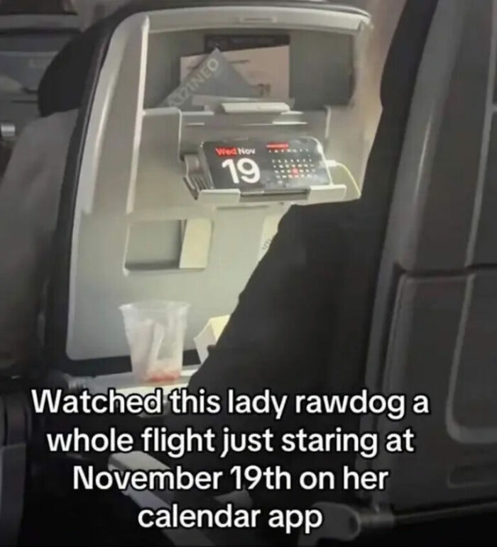 A person on a flight staring at November 19th on a calendar app, a hilarious photo.