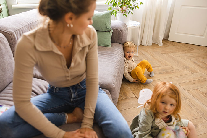 A woman on vacation with a nanny for childcare, as her SIL eyes free childcare, for relaxation. A woman on vacation with a nanny for childcare, as her SIL eyes free childcare, for relaxation.